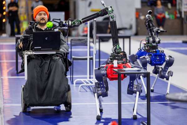 Cybathlon competition, a person in a wheelchair is competing in a parcours