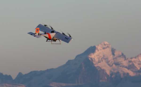 a drohne flying over mountains